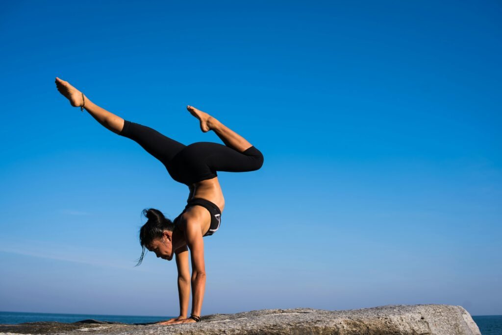 This image depicts a woman performing yoga that enhances her balance.